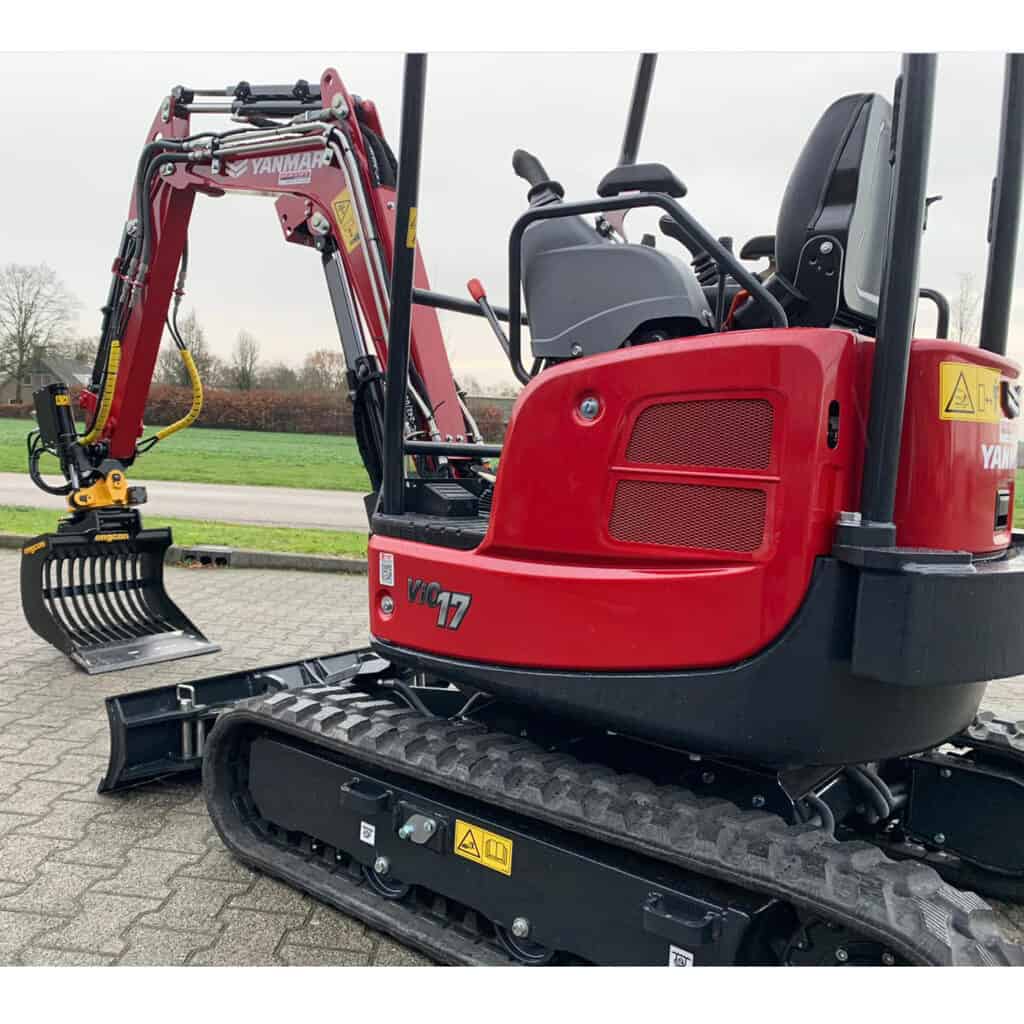 Compacte mini-steenzage met dieselmotor en rubberen rupssよりn voor tuin- en bouwprojecten.