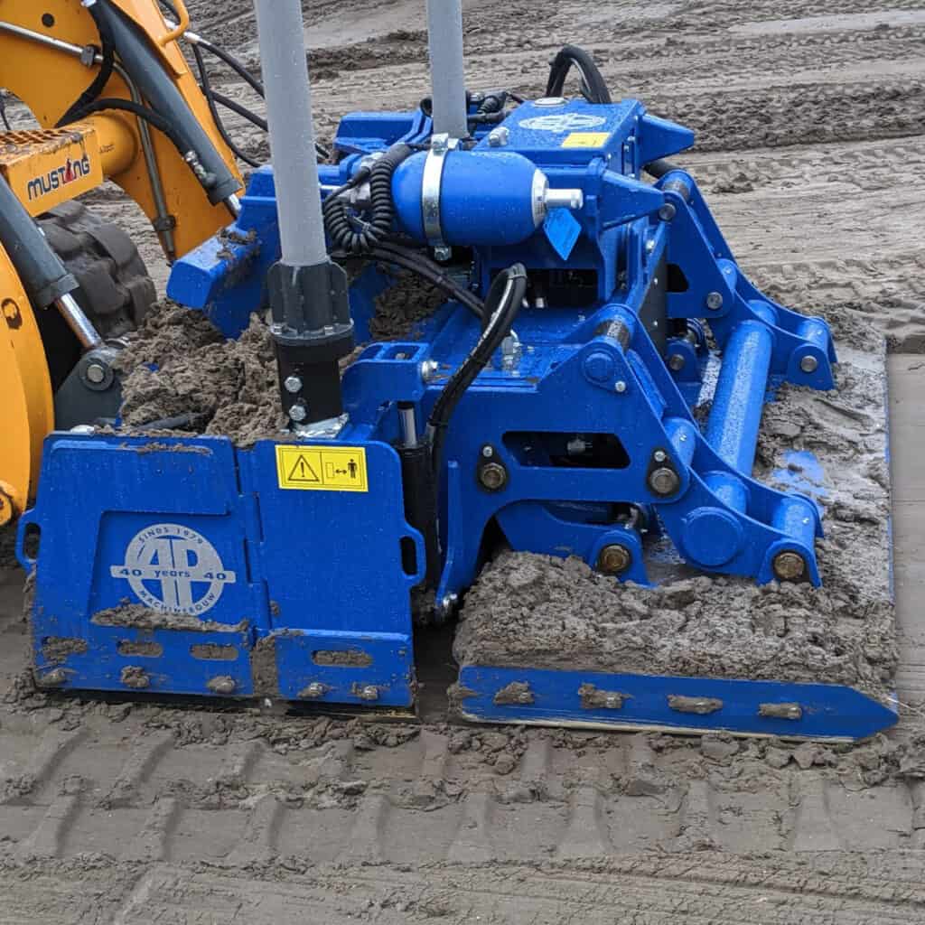 1. Machinale grading machine voor grondbewerking, zijaanzicht.