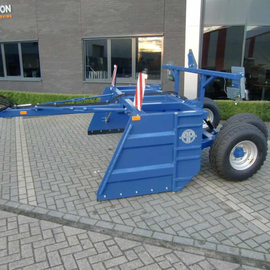 Krachtige blue graafmachine met grote banden voor landbouw of grondverzet.