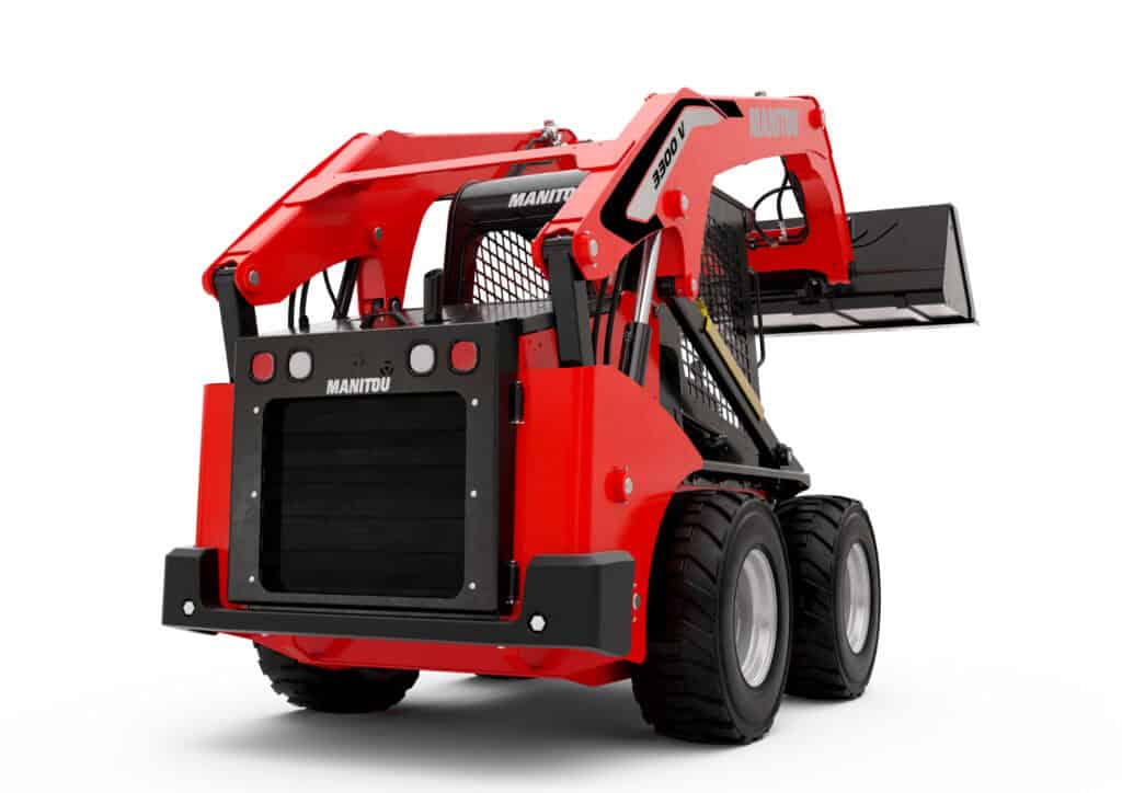 Compacte mini skidsteer met graafbak, geschikt voor agrarisch en bouwgebruik.