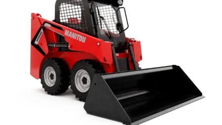 Een kleine redsklipper met cabine en bak, ideaal voor bouw- en tuinwerkzaamheden.