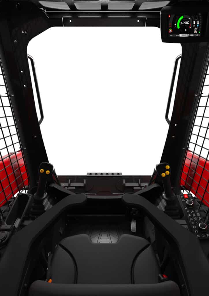 Zandbakbesturing met digitale displays en ergonomische joystickbediening.