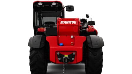 Stille krachtpatser: rode Manitou heftruck voor industrieel gebruik en transport.