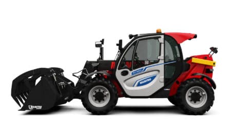 Manitou verreiker met cabine en banden, geschikt voor bouw en landbouw.