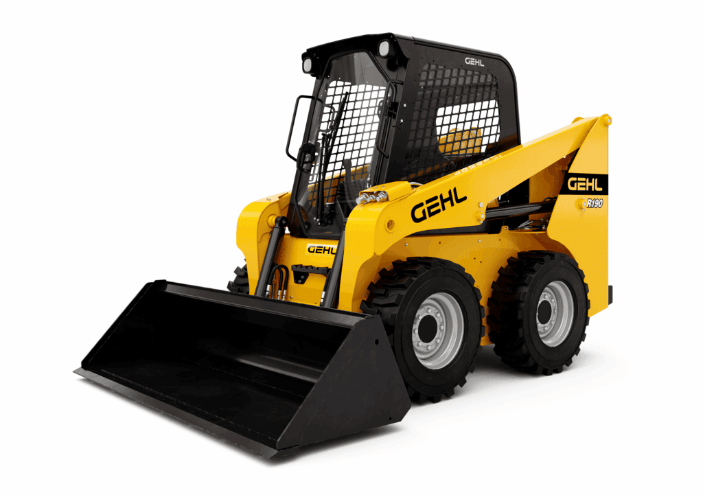 1. Geel compacte skidloader met cabine en frontlader voor bouw en tuinwerkzaamheden.