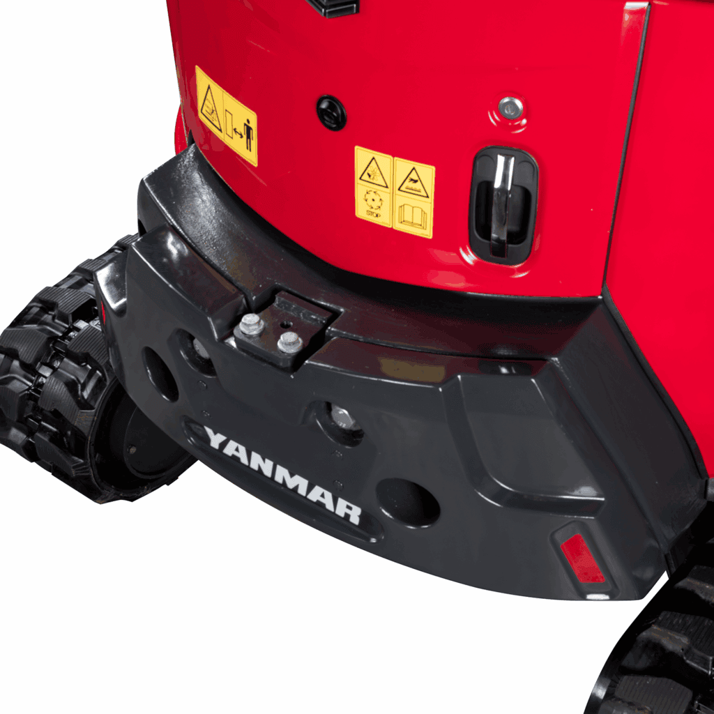 Veiligheidsstickers en bedieningsknoppen op een professionele landbouwmachine.