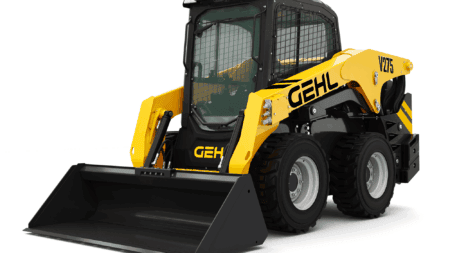 Compacte Gehl skid steer loader met cabine voor bouw en tuinonderhoud.