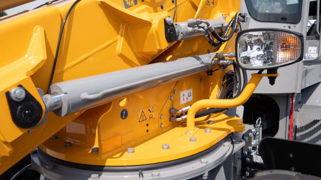 Hijsarm en verlichting van bouwmachine, industriële apparatuur, zwaar materieel.