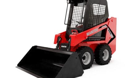 Mini skidloader met sjofel en cabines voor grondverzet, geschikt voor kleine bouw- en tuinwerkzaamheden.