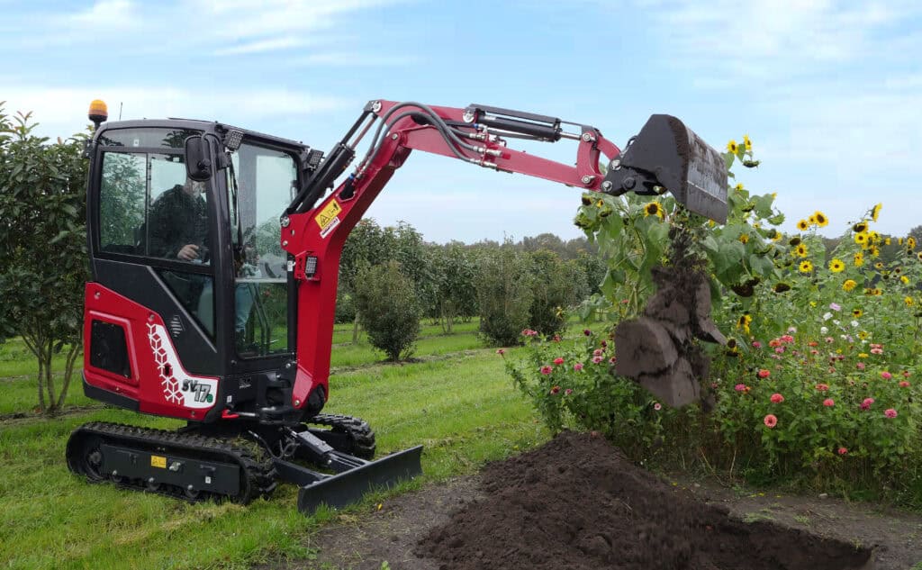 Compacte graafmachine voor tuin- en hovenierswerkzaamheden.